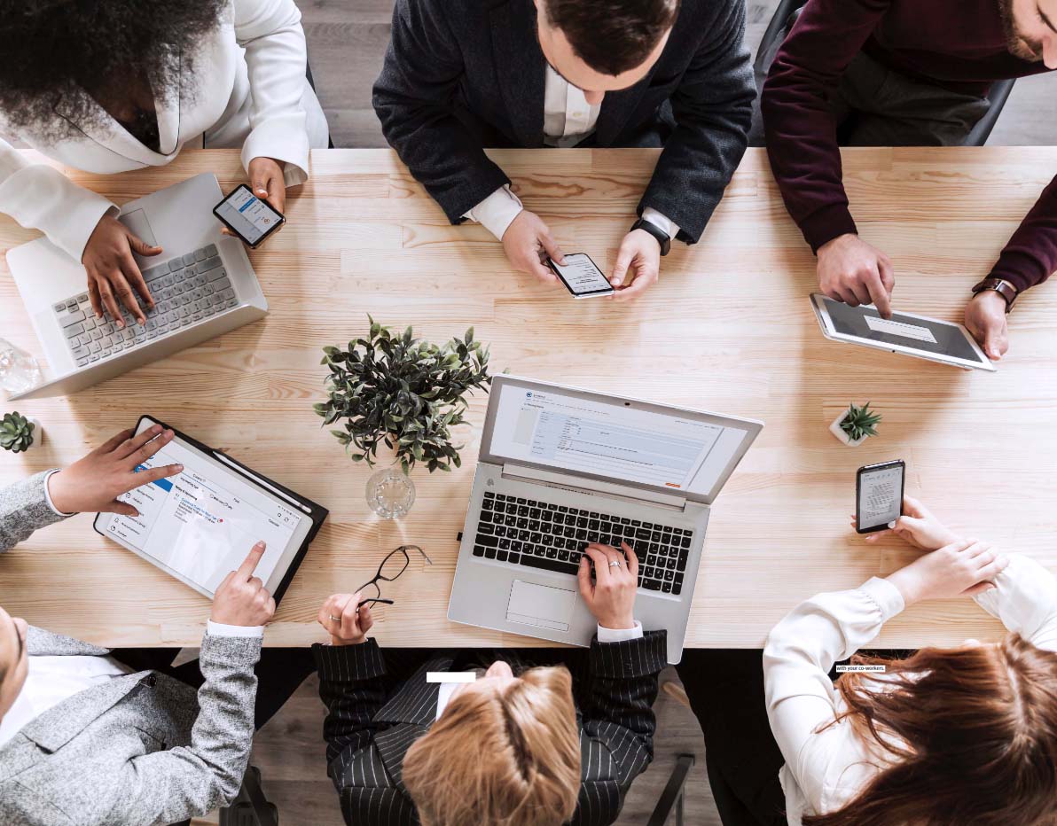 Board members and administrators holding a meeting together while using Convene, the board management software and app Board members and administrators holding a meeting together while using Convene, the board management software and app