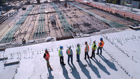 Engineers overlooking construction site Engineers overlooking construction site