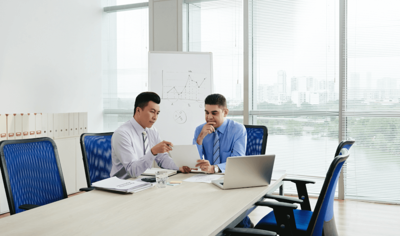 Two board members preparing for the annual general meeting