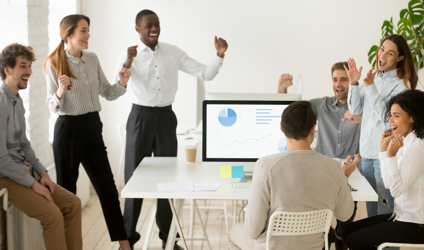 A diverse team collaborating in an equitable and inclusive workplace