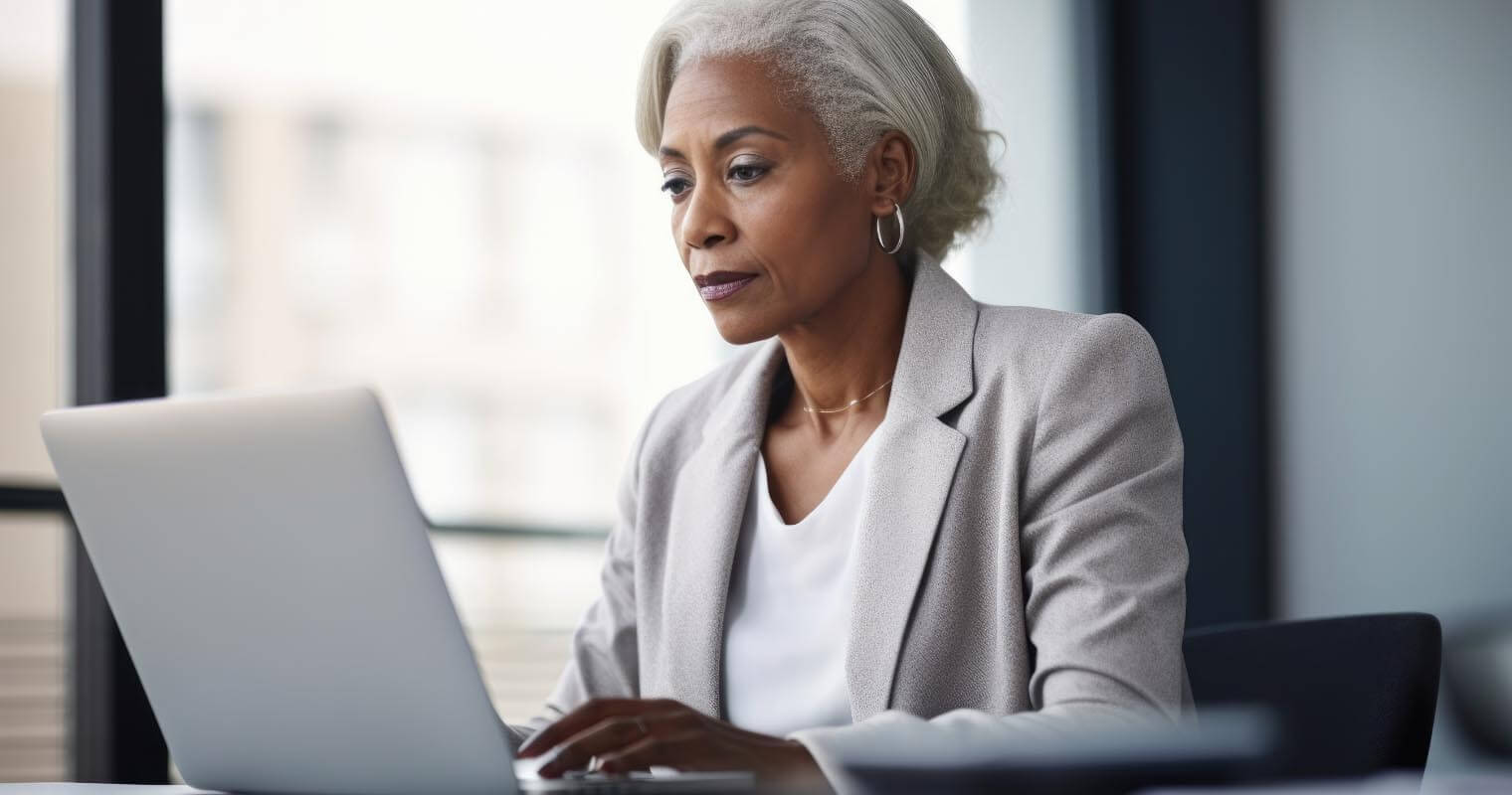 A CEO doing their tasks with a laptop