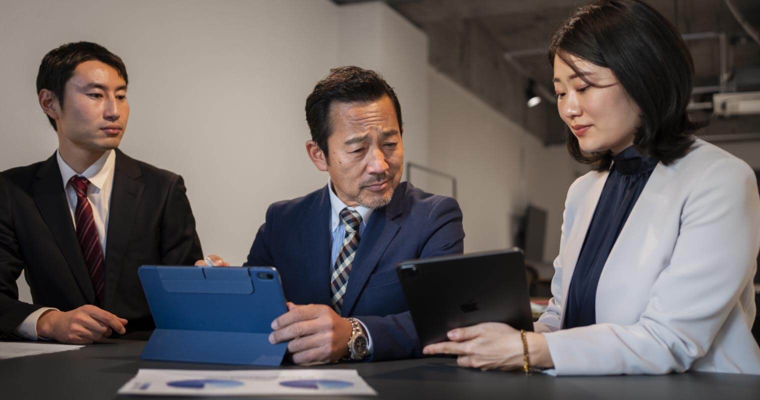 A CEO with their employees