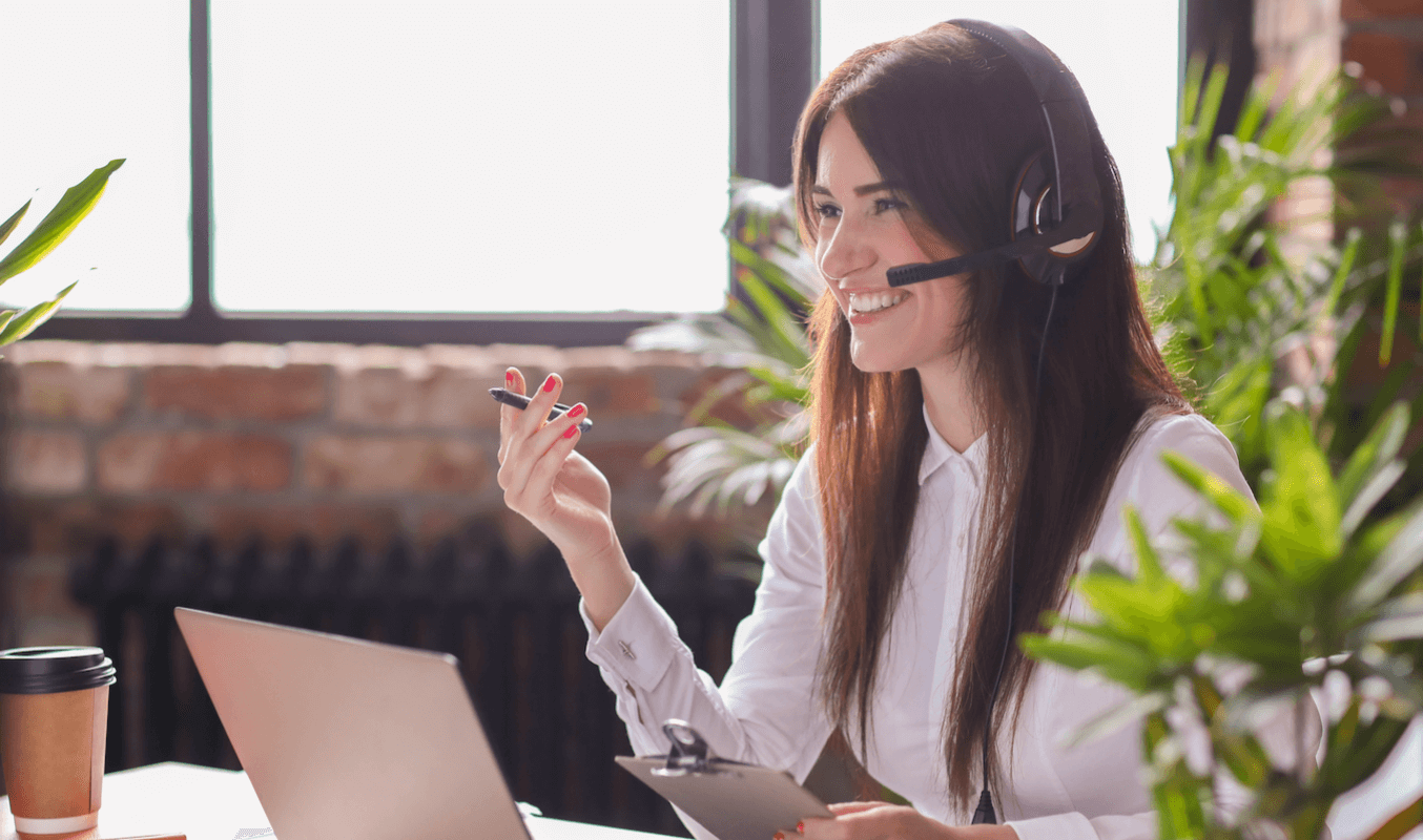 A woman participating in an effective hybrid workplace